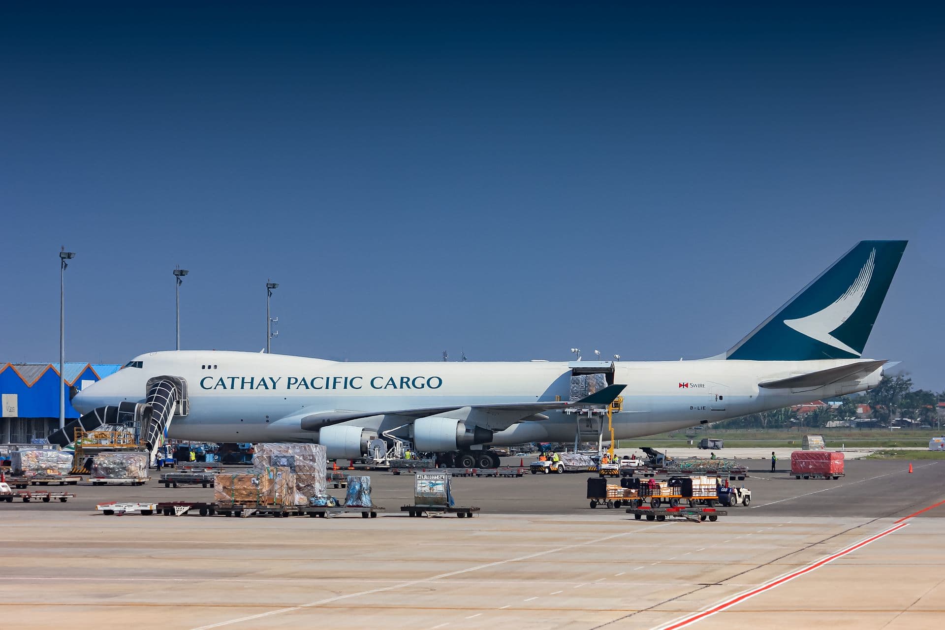 Freighter aircraft being loaded on the apron