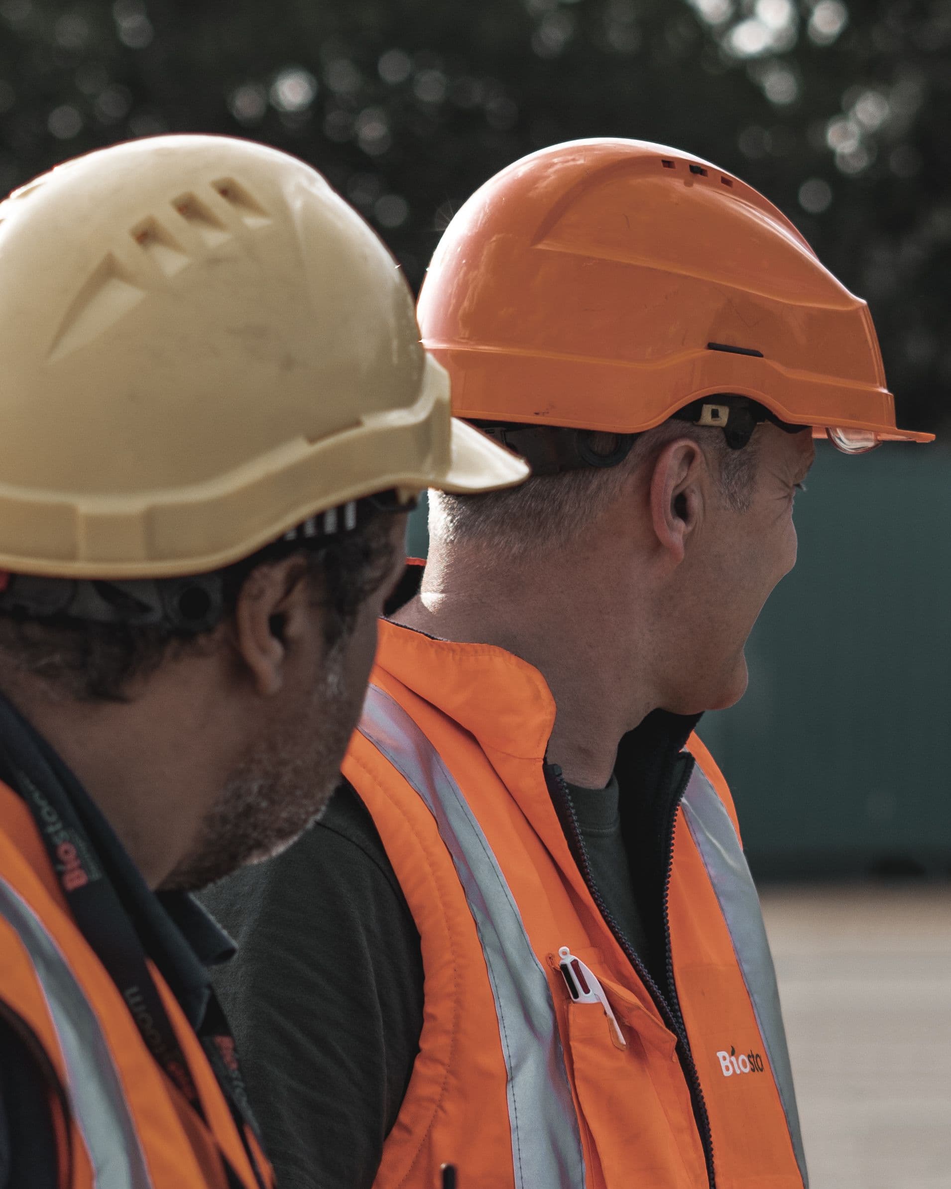 Operations staff in safety gear at a terminal