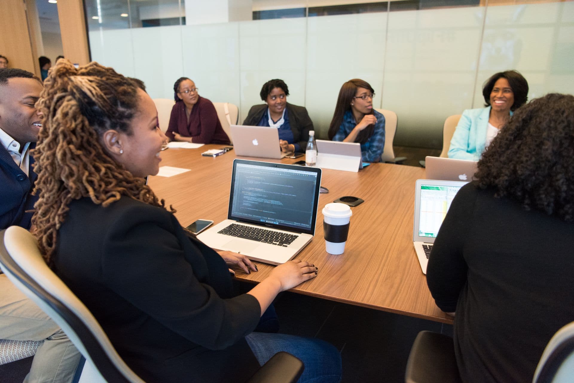 Colleagues in discussion at the office